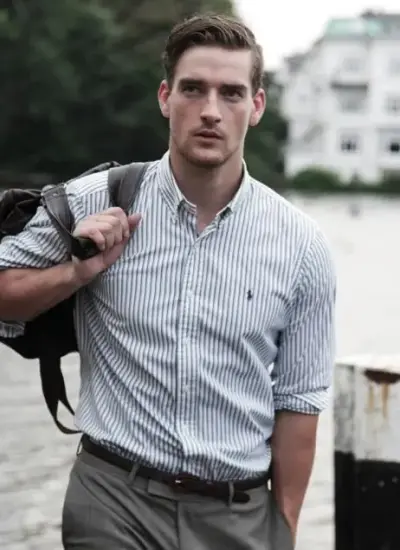 A man in a striped shirt and pants